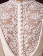 A white dress with a luxurious design - Image 3